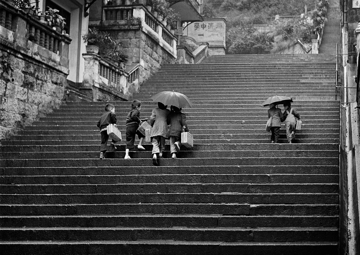 Unlocking the Essence of Street Photography: A Fan Ho Inspired Journey